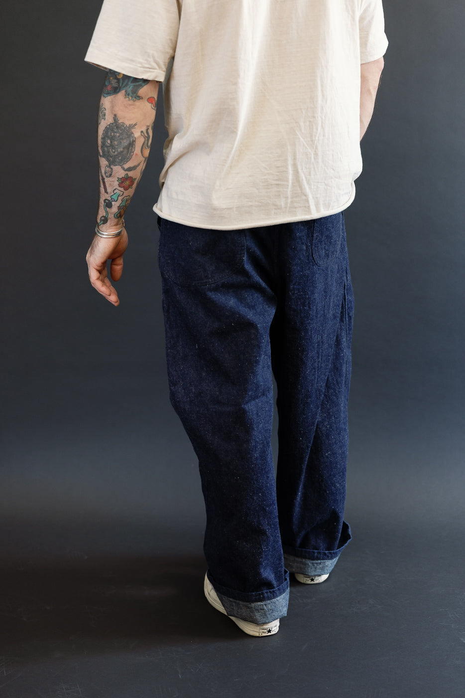 Back view, full body of male model 5'9