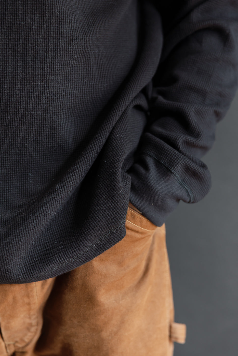 Close-up side view of a male model, 5'9