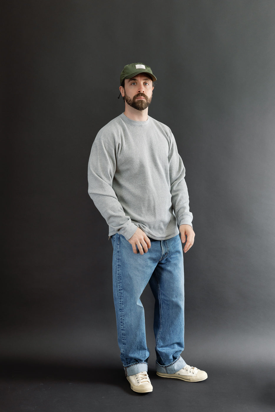 Full body front view of a male model, 5'9