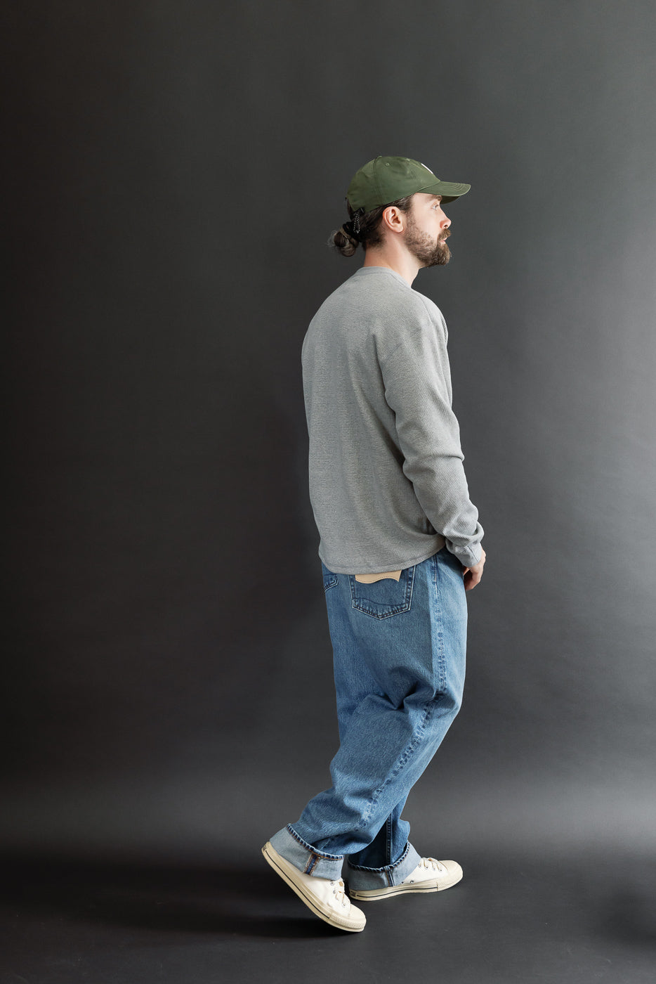 Full body side view of male model, 5'9