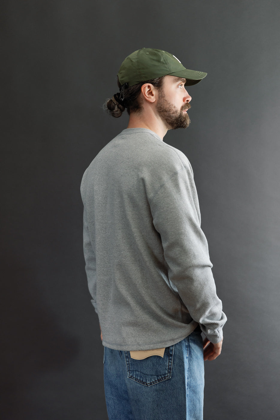 Back view of a male model (5'9