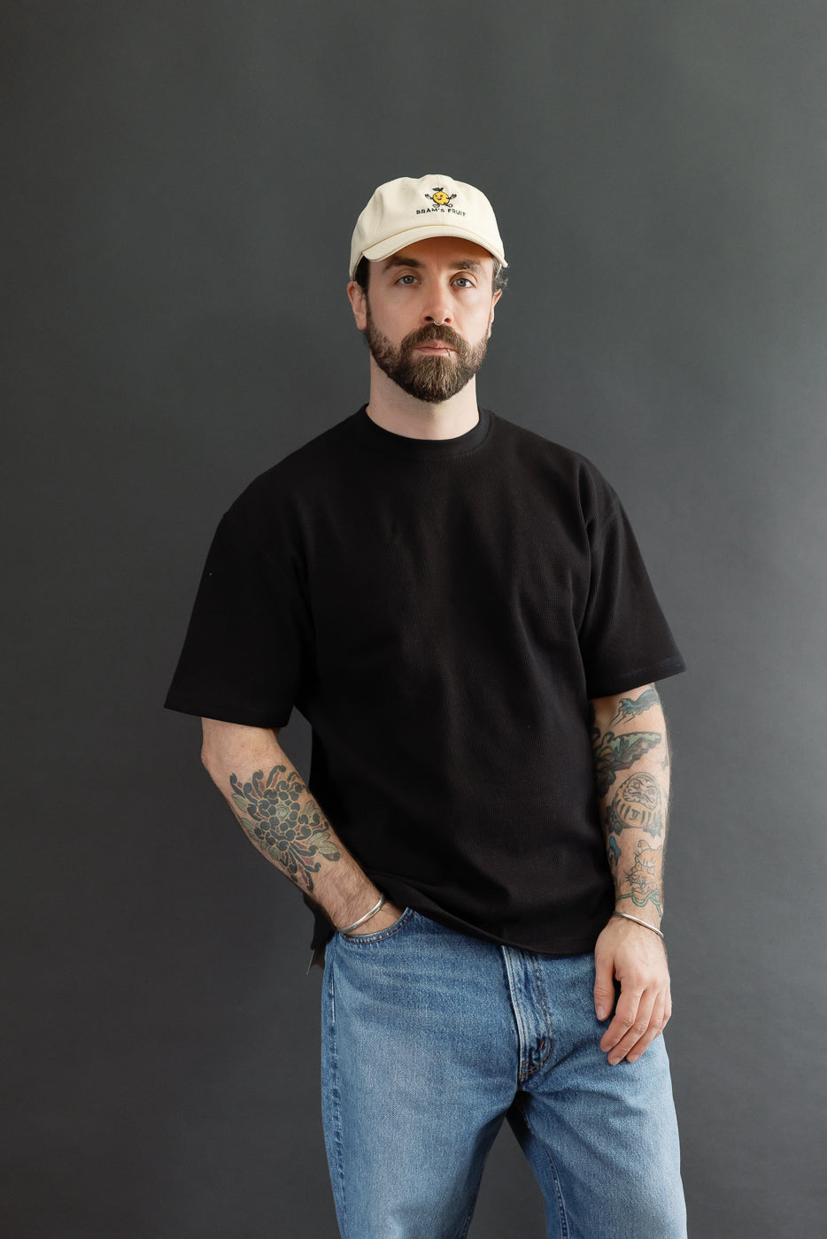 Full body front view of a male model, 5'9