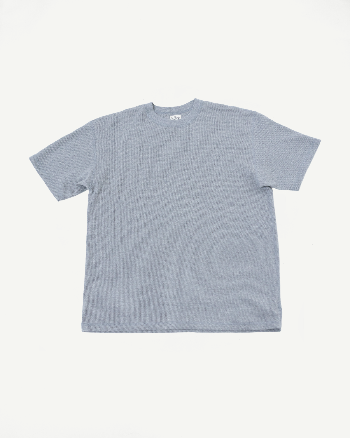 Front view flat lay of a light blue textured short sleeve t-shirt.