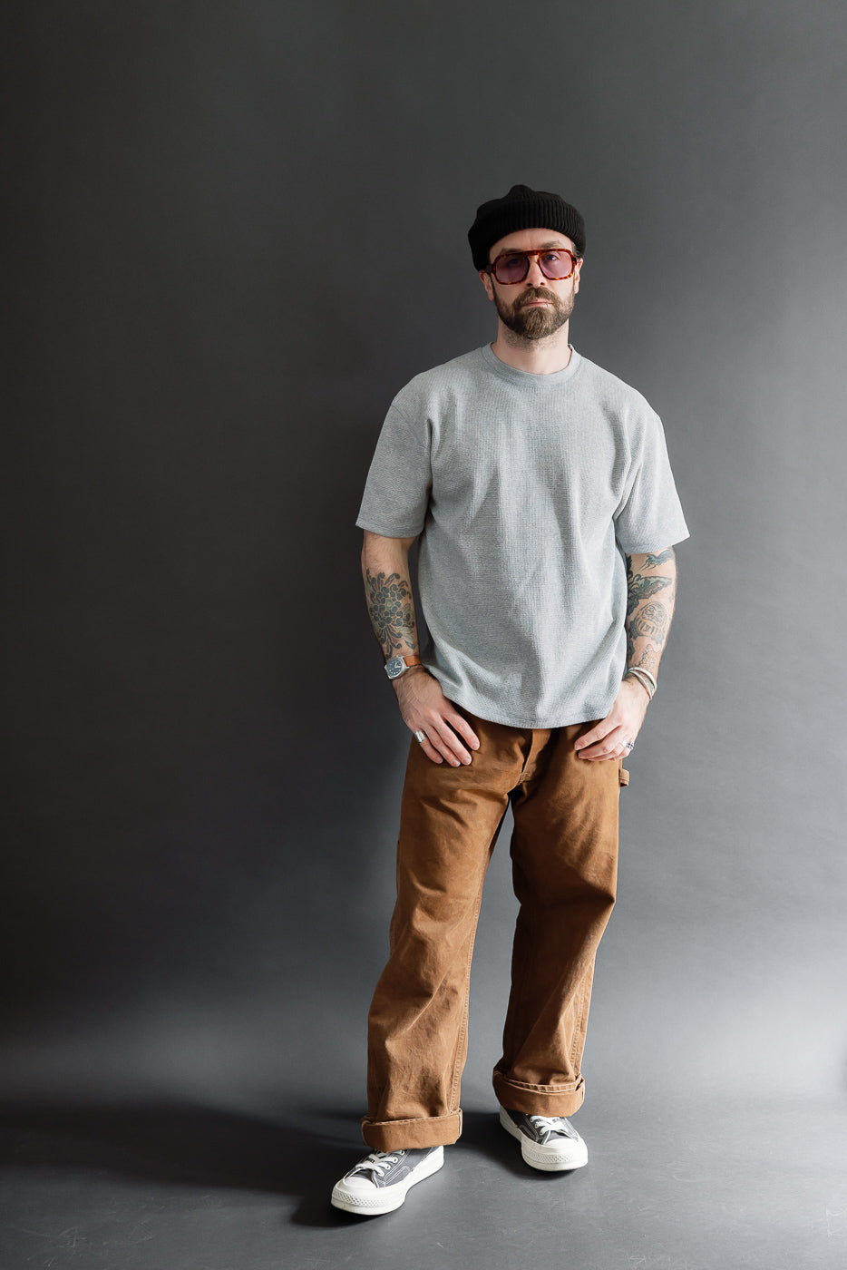 Full body front view of a male model, 5'9