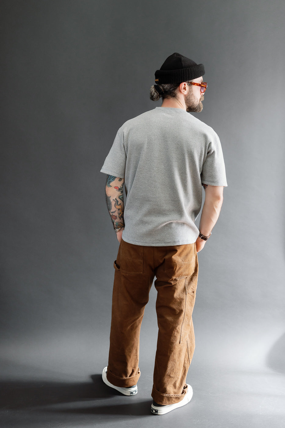 Full body back view of a male model, 5'9