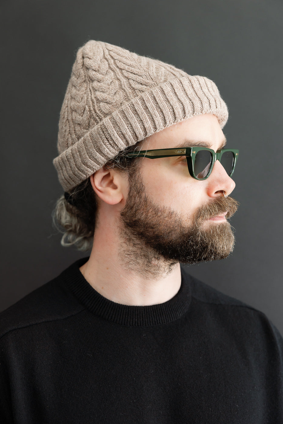 Close-up side view of a male model, 5'9