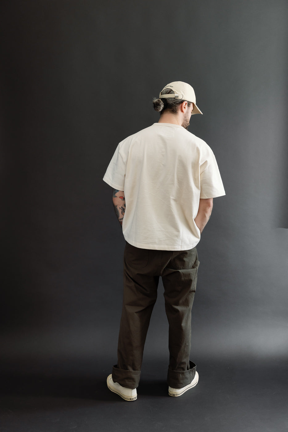 Full body back view of a male model, 5'9
