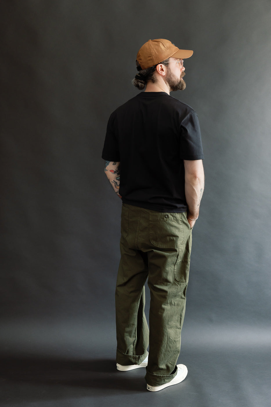 Full body rear view of male model 5'9