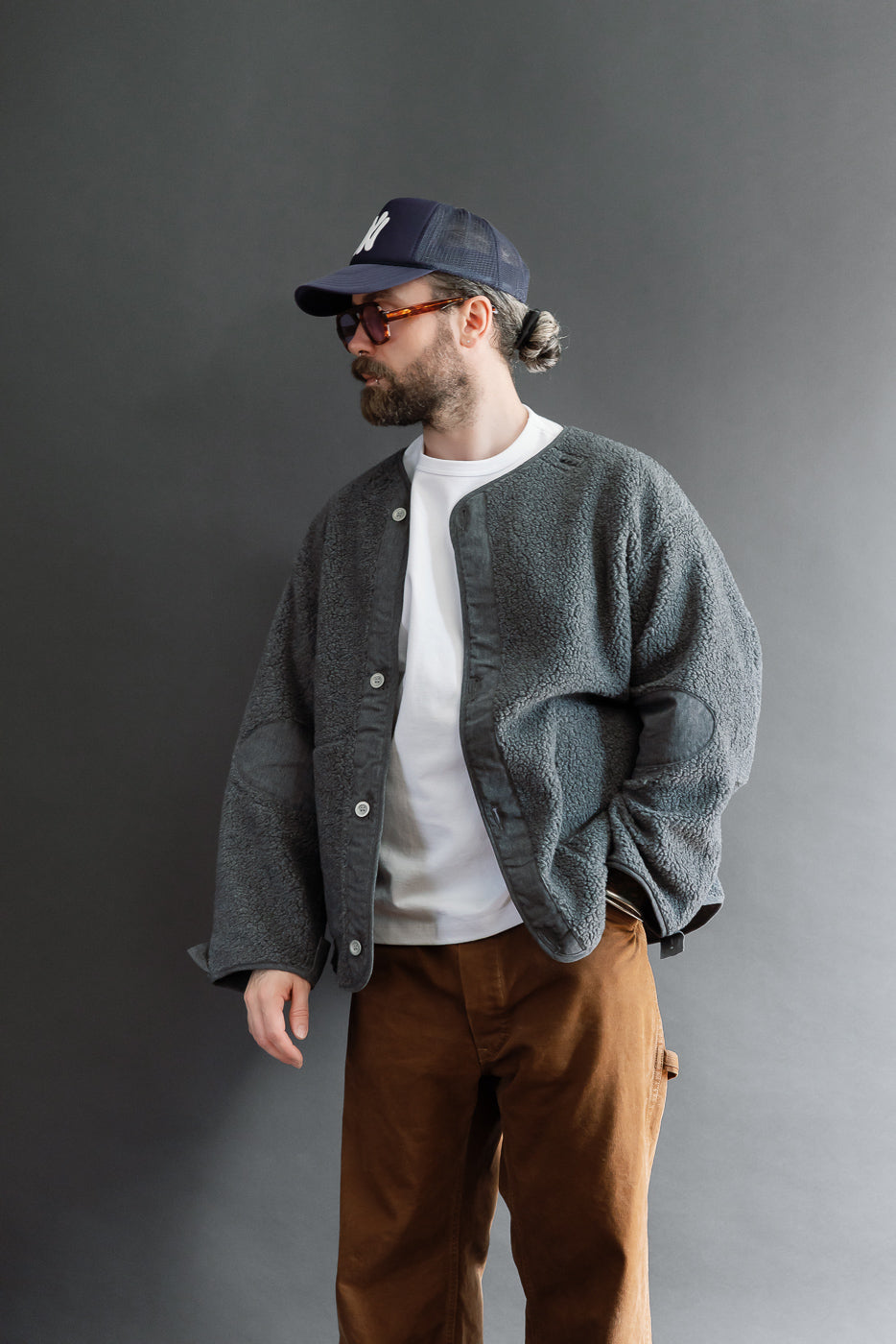 Full body front view of a male model, 5'9