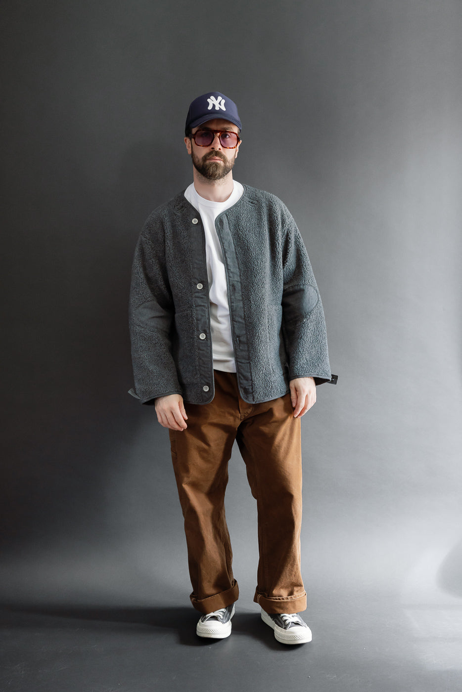 Full body front view of a male model, 5'9