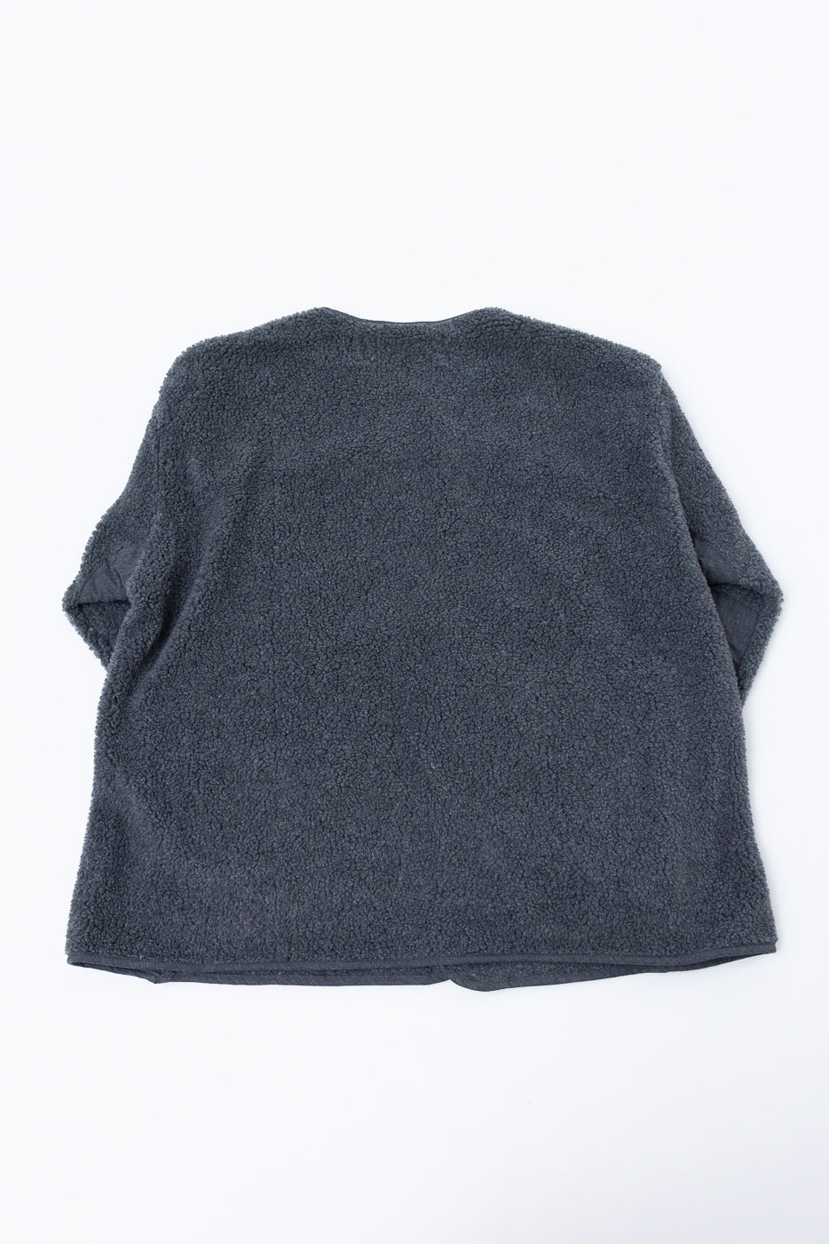 Back view flat lay of a charcoal grey textured fleece pullover.
