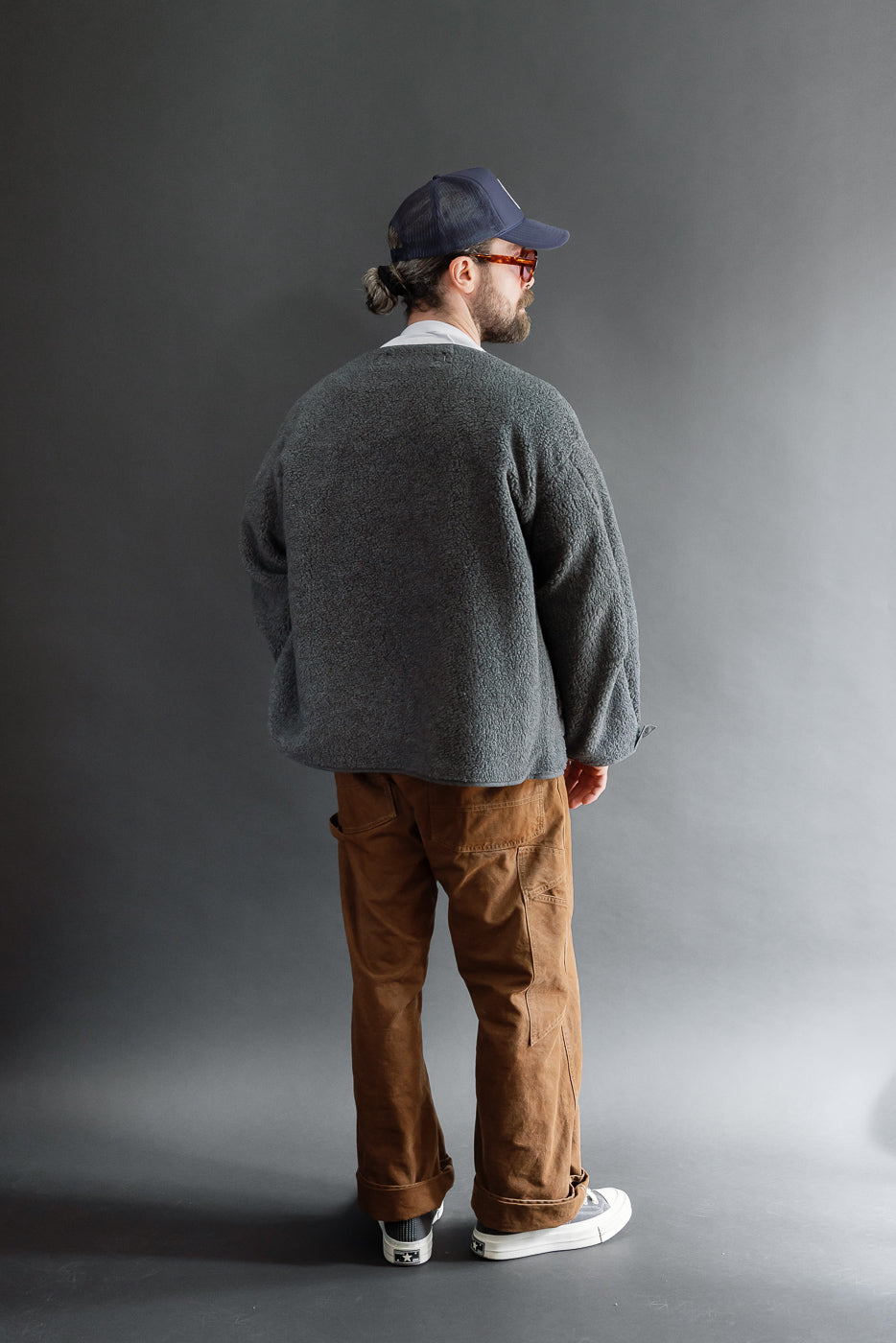 Full body back view of a male model, 5'9