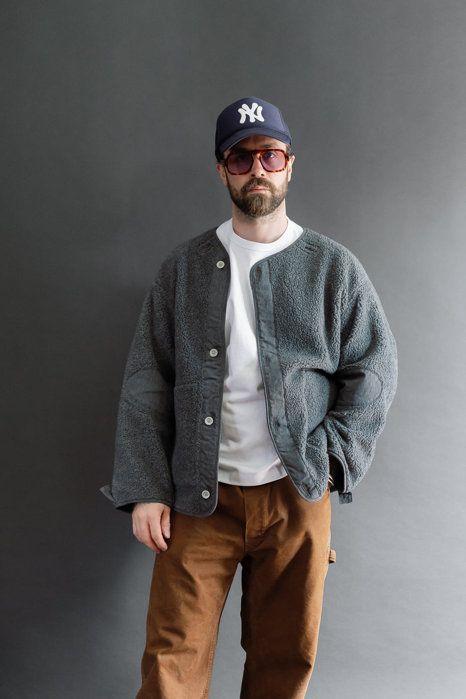 Full body front view of a male model, 5'9