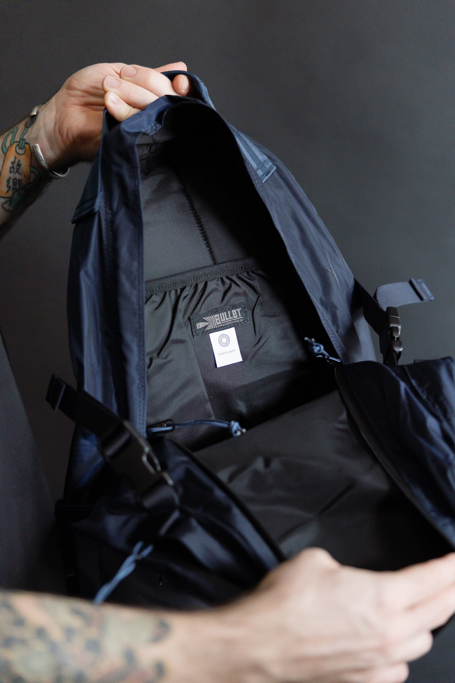 Close-up of navy Ballistics nylon ripstop backpack interior with label and inside pocket.