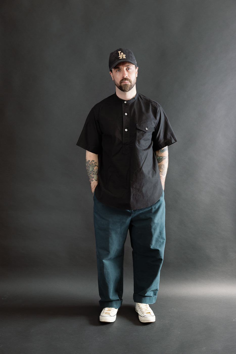 Full body front view of male model 5'9
