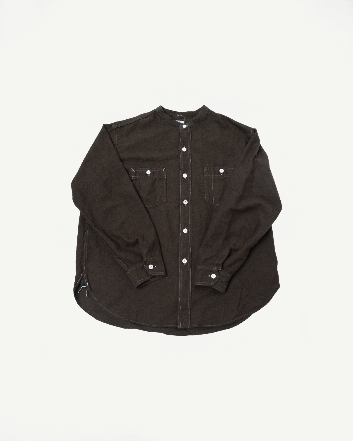 Flat lay front view of Post O'Alls St. Louis Band Collar tobacco heather flannel shirt, showing button details and dual chest pockets.