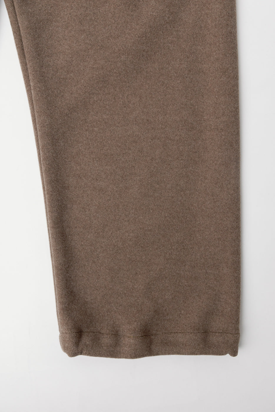 Close-up of front pant leg hem, brown supersoft sweat cloth fabric, Post Coach Pants