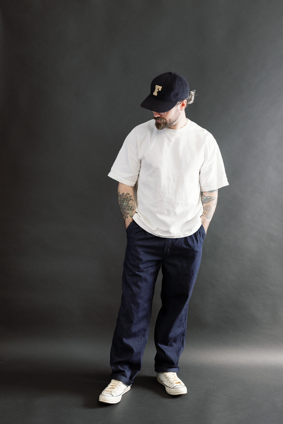 Full body front view of male model 5'9