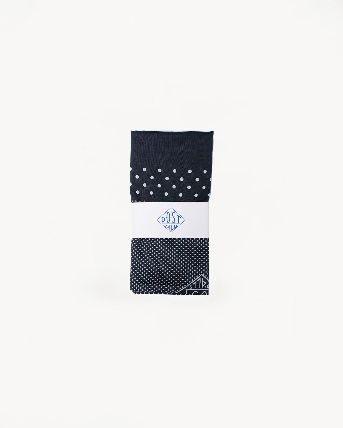 Front flat lay of charcoal Post O’Alls bandana scarf with polka dot pattern and logo tag.
