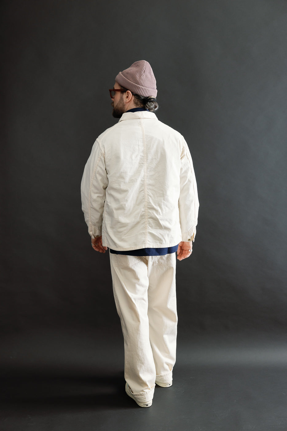 Full body rear view of male model 5'9