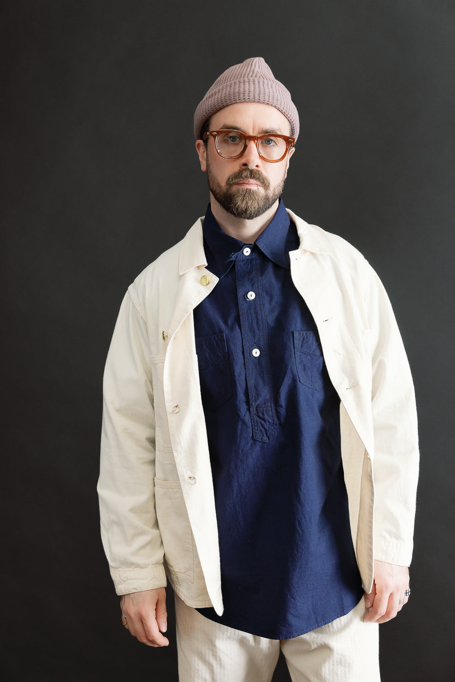 Front view, mid-body shot of male model 5'9