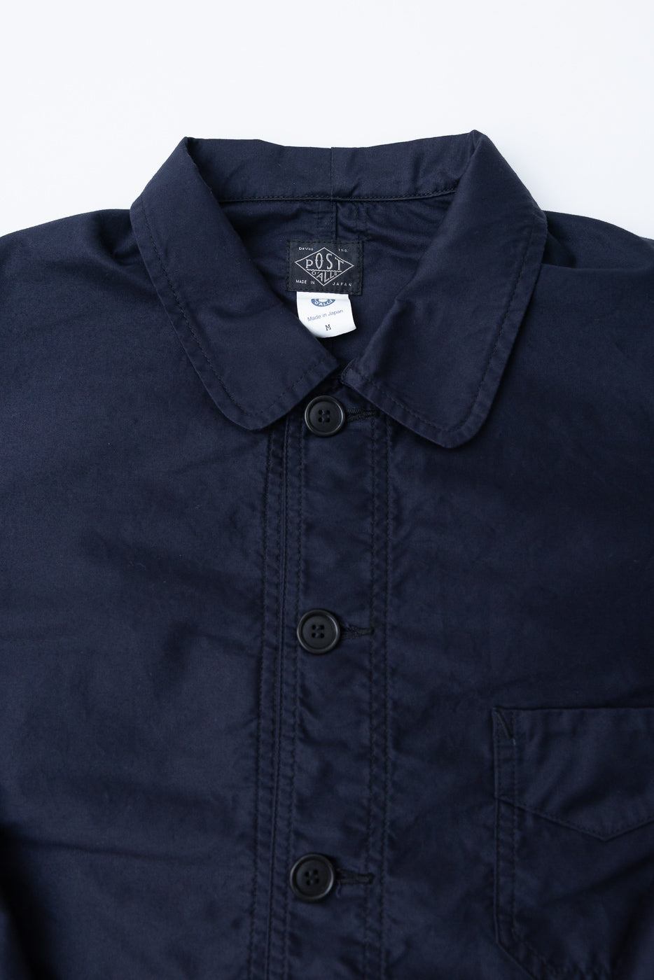 3135-LMN - Post Chinois Travail 2 Light Moleskin - Dk. Navy: A navy-blue work jacket with a rounded collar, black button front, and chest patch pocket. Features a pre-washed cotton moleskin fabric for a tailored feel.
