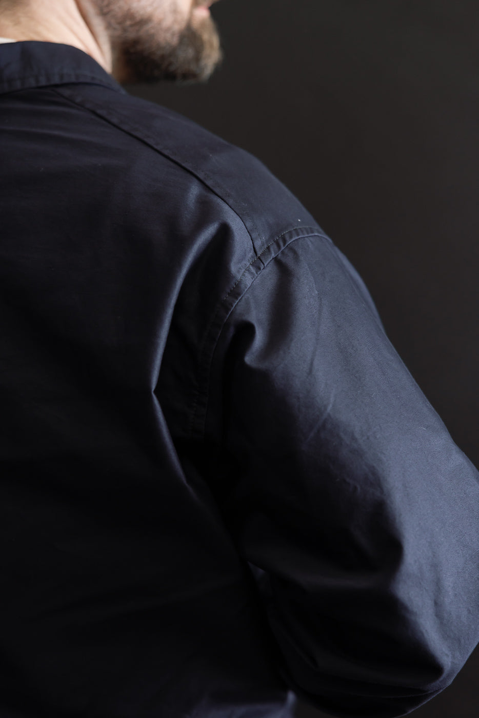 Close-up of the 3135-LMN - Post Chinois Travail 2 Light Moleskin - Dk. Navy, highlighting its dark navy fabric and relaxed fit, embodying a fusion of French-Chinese workwear aesthetics.