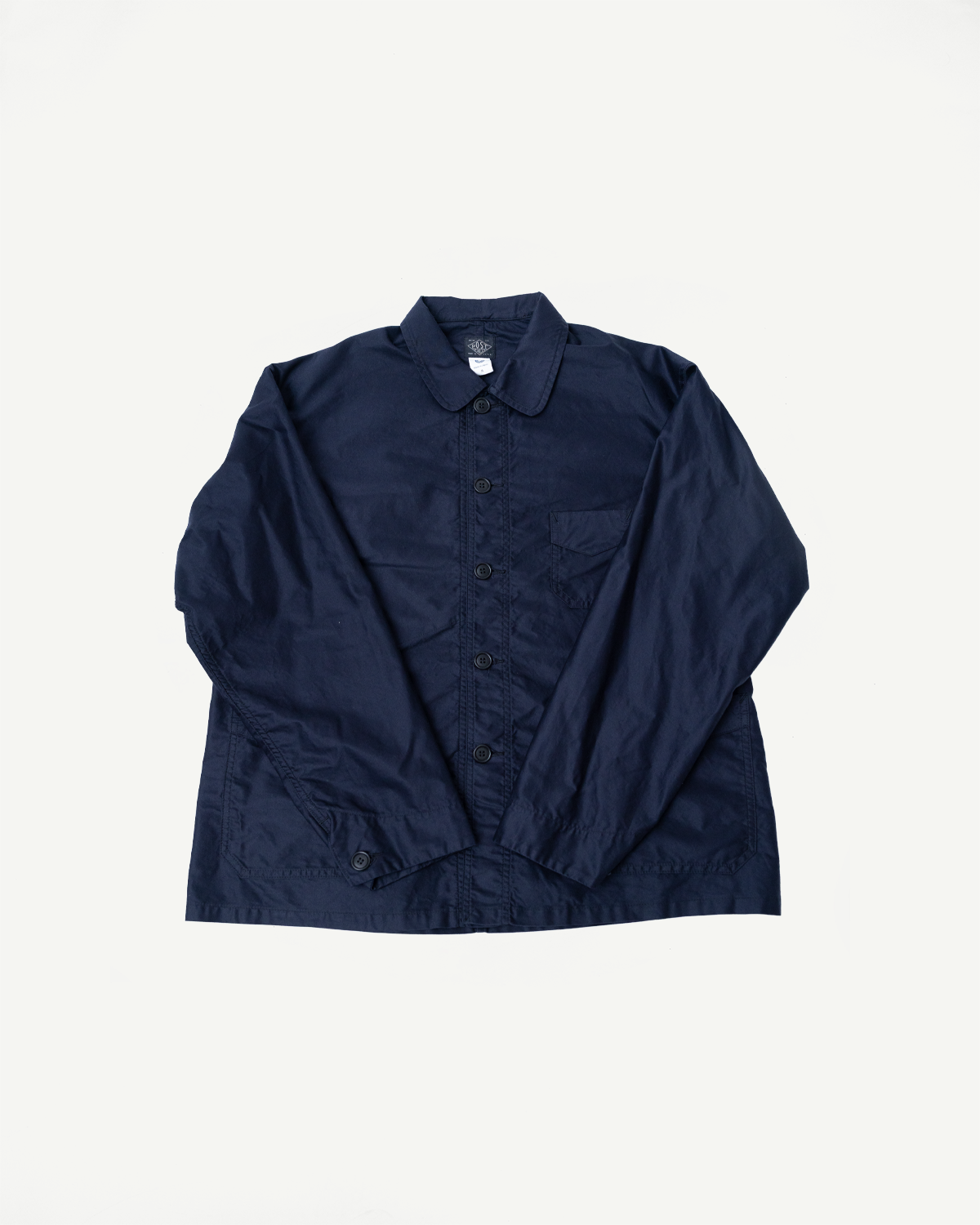 Navy-blue 3135-LMN Post Chinois Travail 2 jacket, featuring a button-front, rounded collar, chest pocket, and cropped silhouette in pre-washed cotton moleskin, showcasing Dant's blend of heritage and luxury.