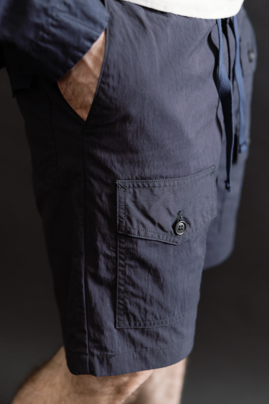 Close-up side view of male model 5'9