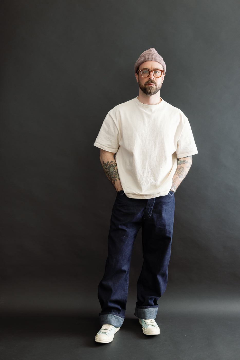 Full body front view of a male model, 5'9