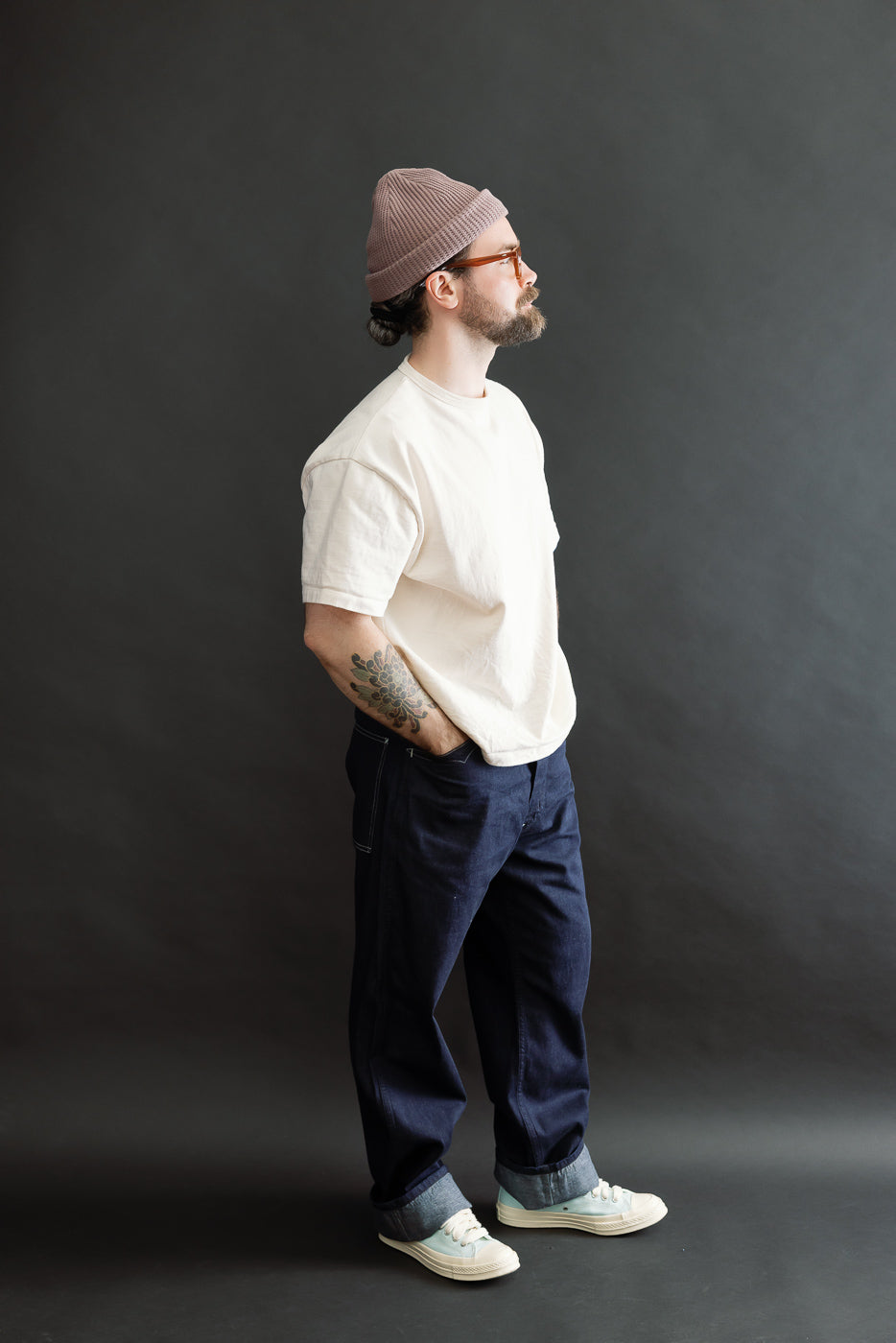 Full body, left side view of male model 5'9