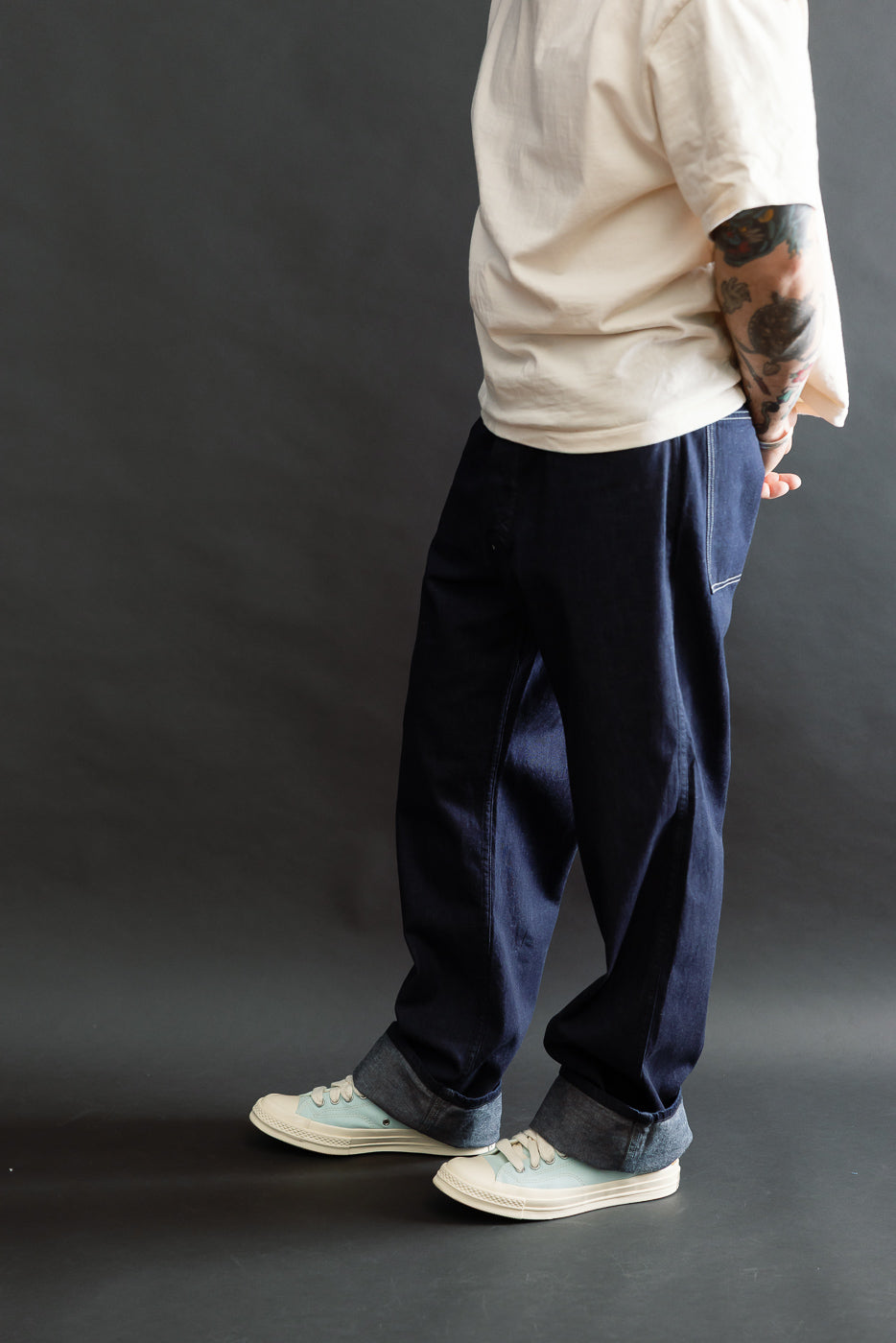 Side view full body of male model 5'9