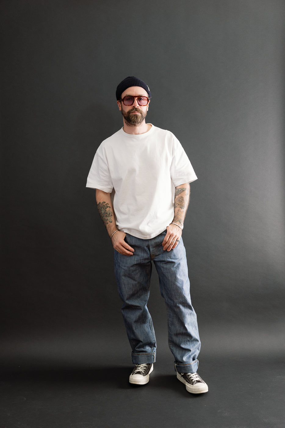 Full body front view of a male model, 5'9