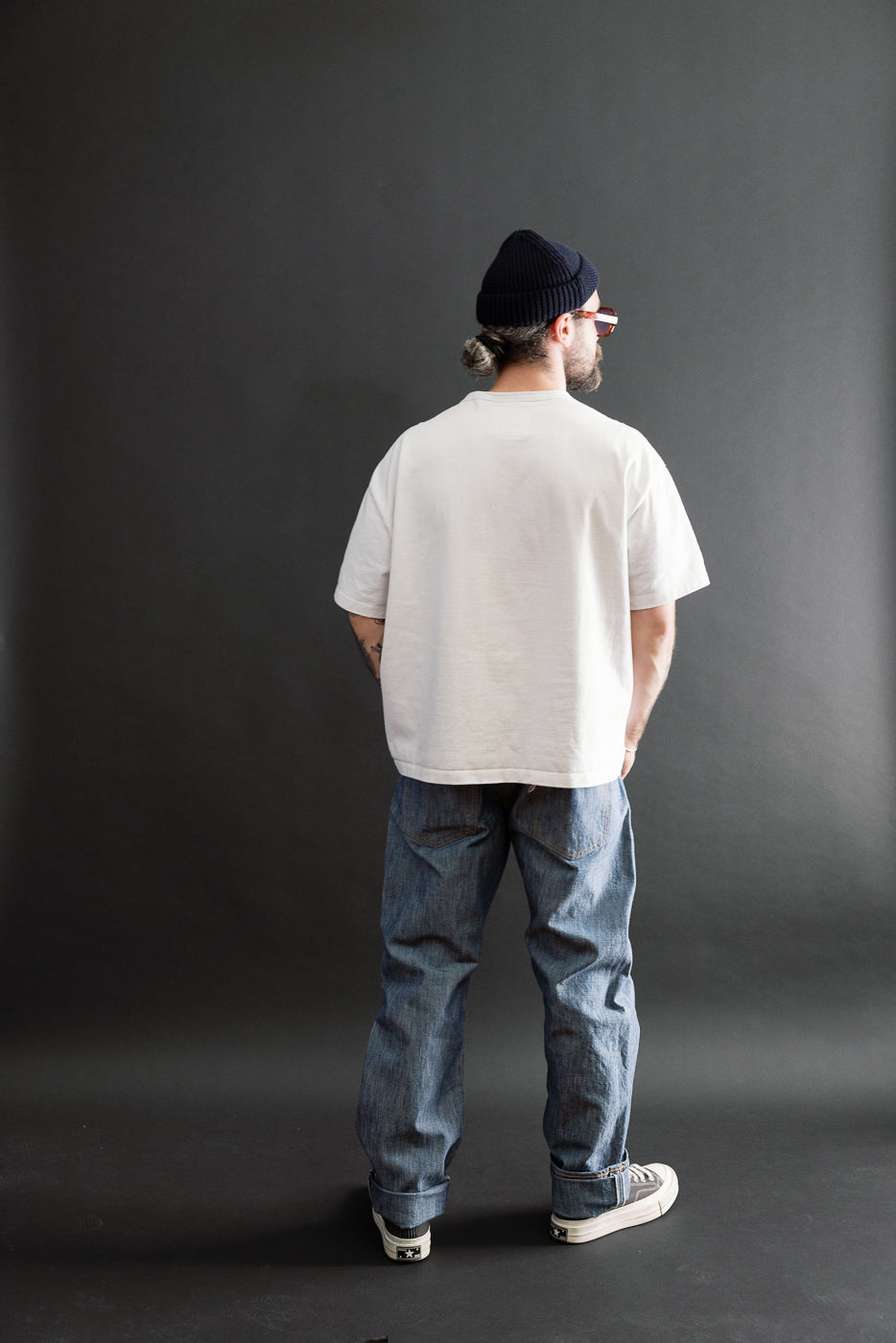 Full body back view of a male model, 5'9