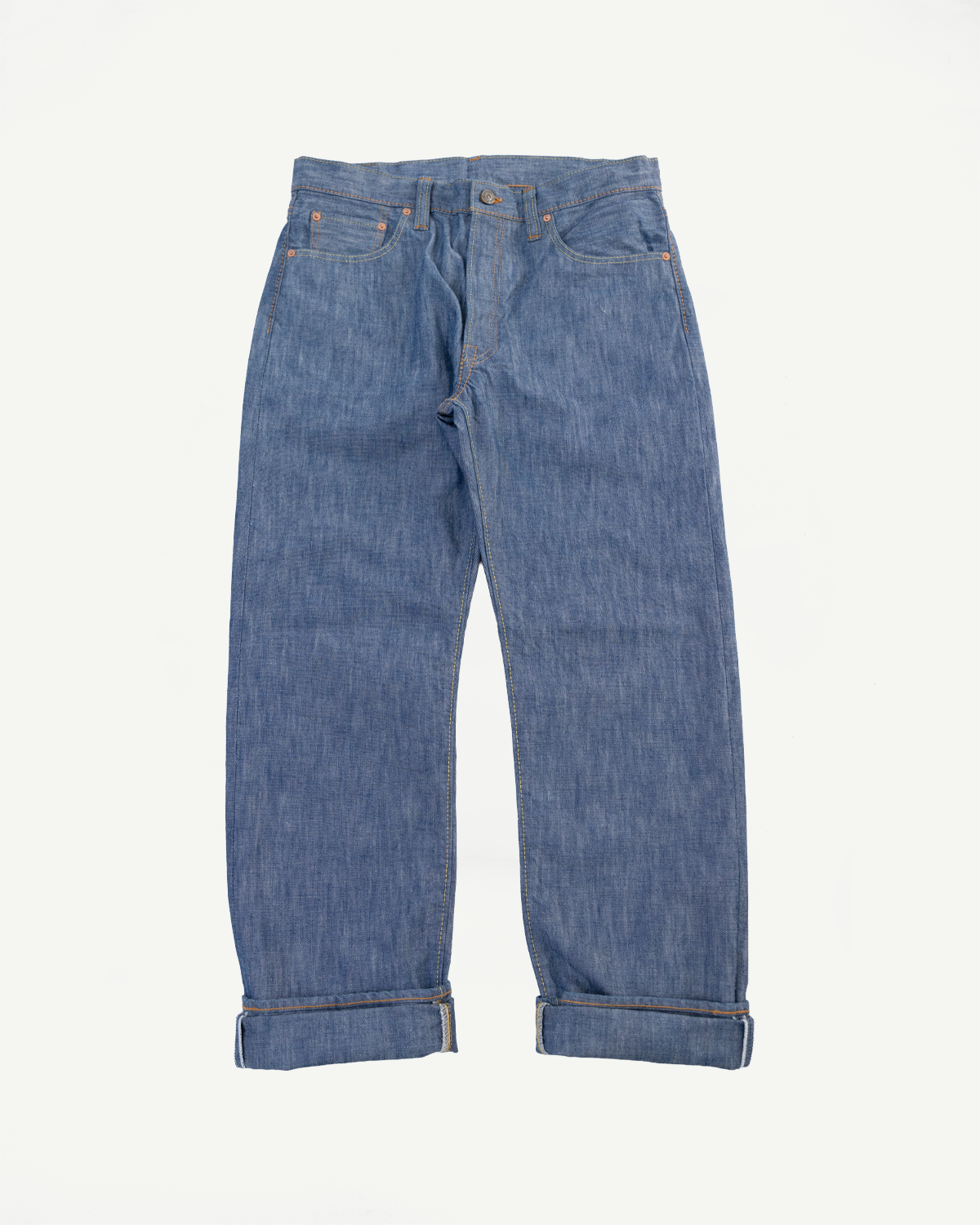 Front view flat lay of blue denim jeans with cuffed hems on a white background.
