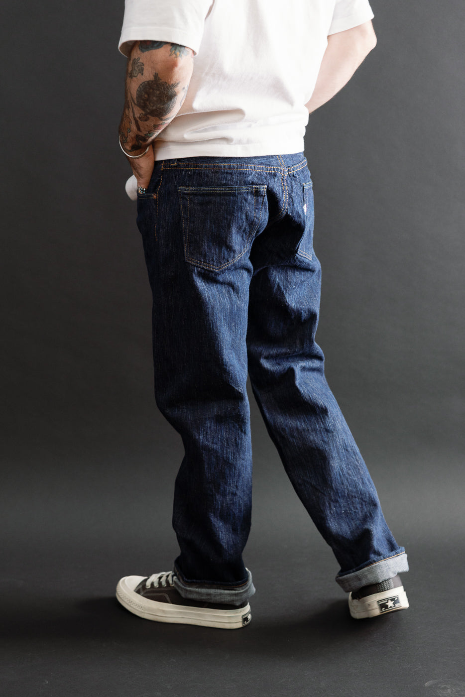 Back view of full body shot: male model, 5'9