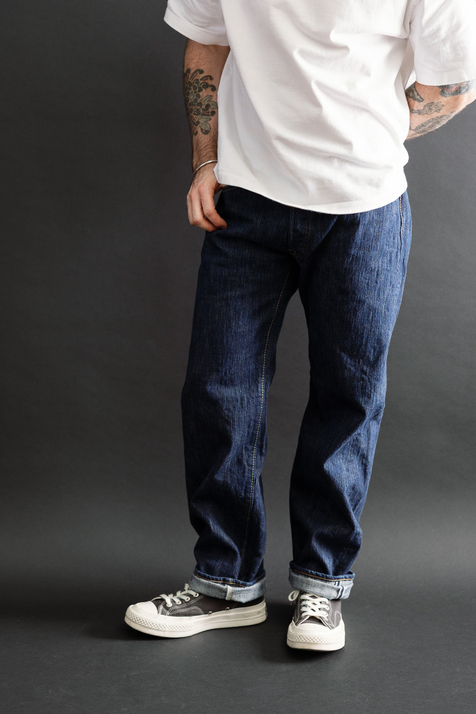 Full body front view of a male model, 5'9
