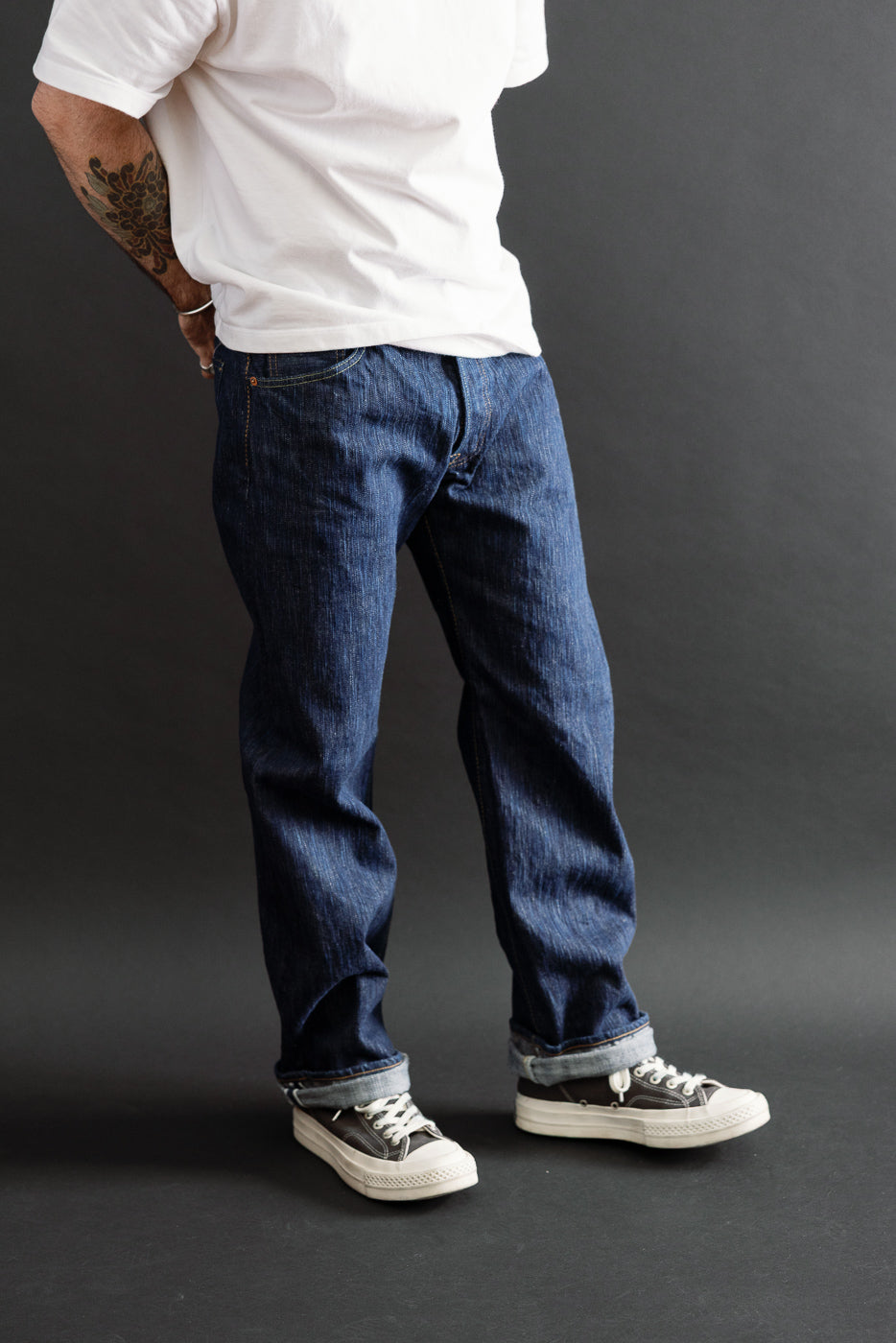 Full body side view of a male model, 5'9