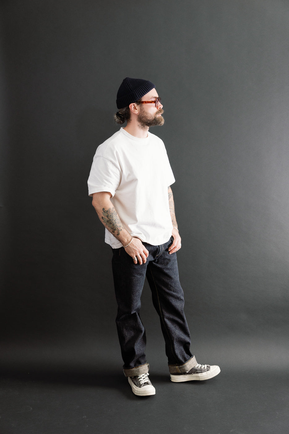 Full body side view of a male model, 5'9