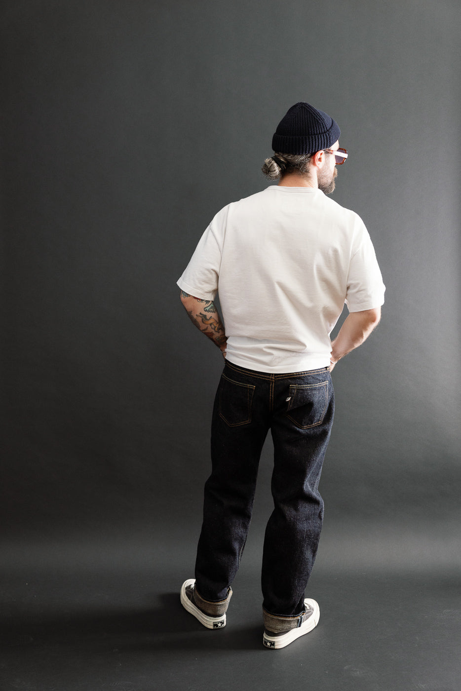 Full body back view of a male model, 5'9