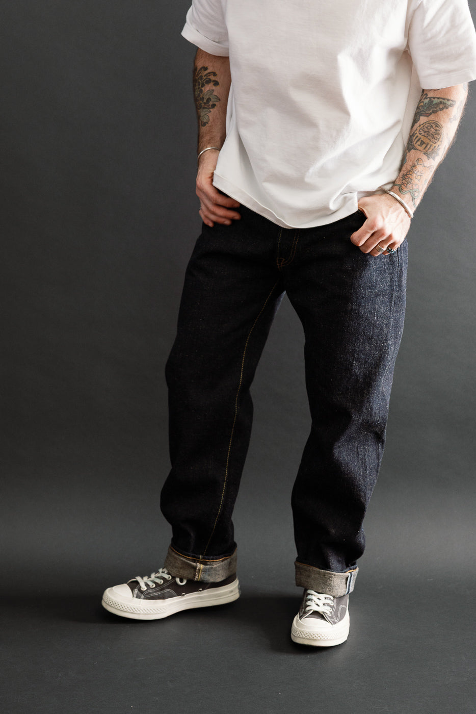 Full body front view of a male model, 5'9
