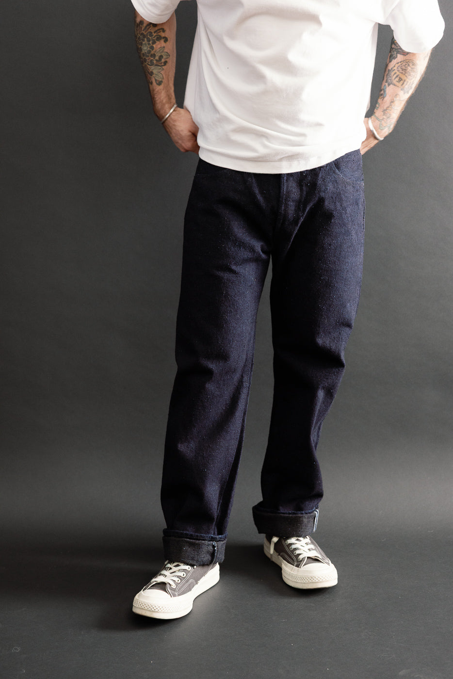 Full body front view of a male model, 5'9