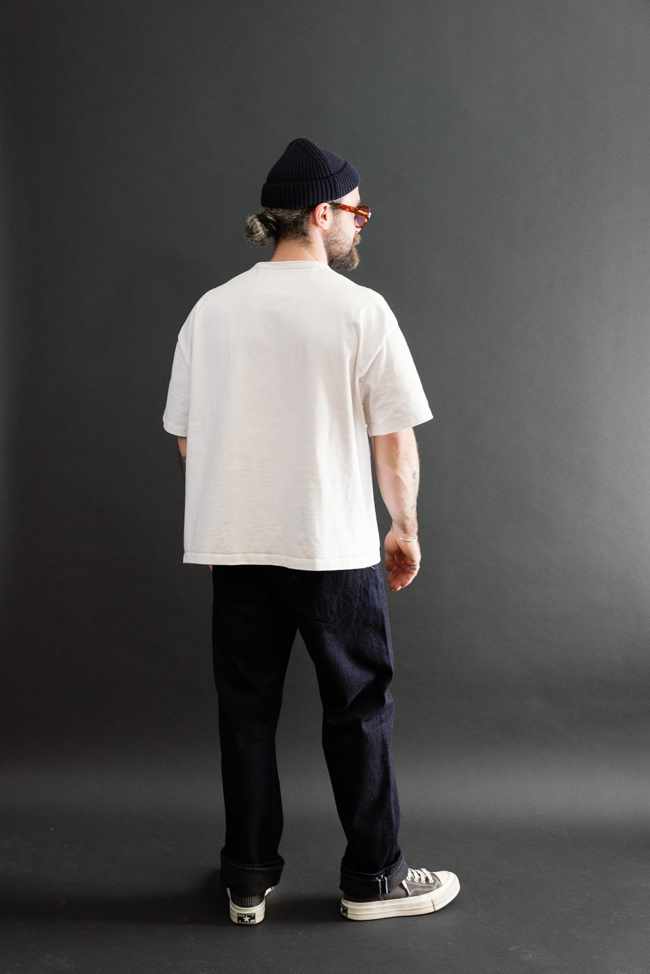Back view of full body shot: male model, 5'9