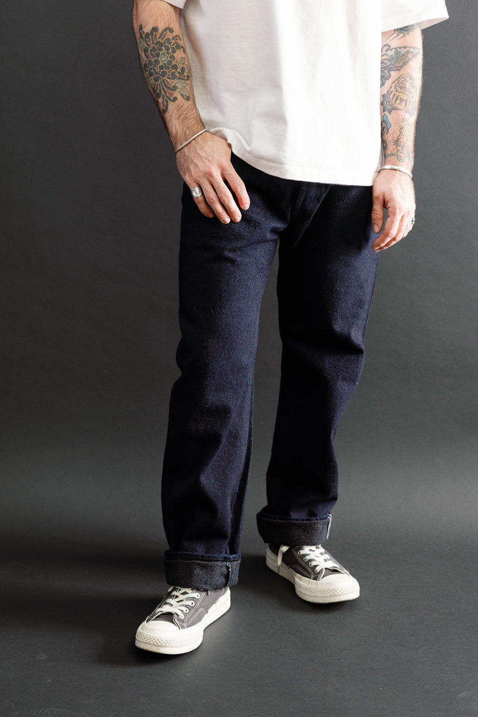 Full body front view of a male model, 5'9