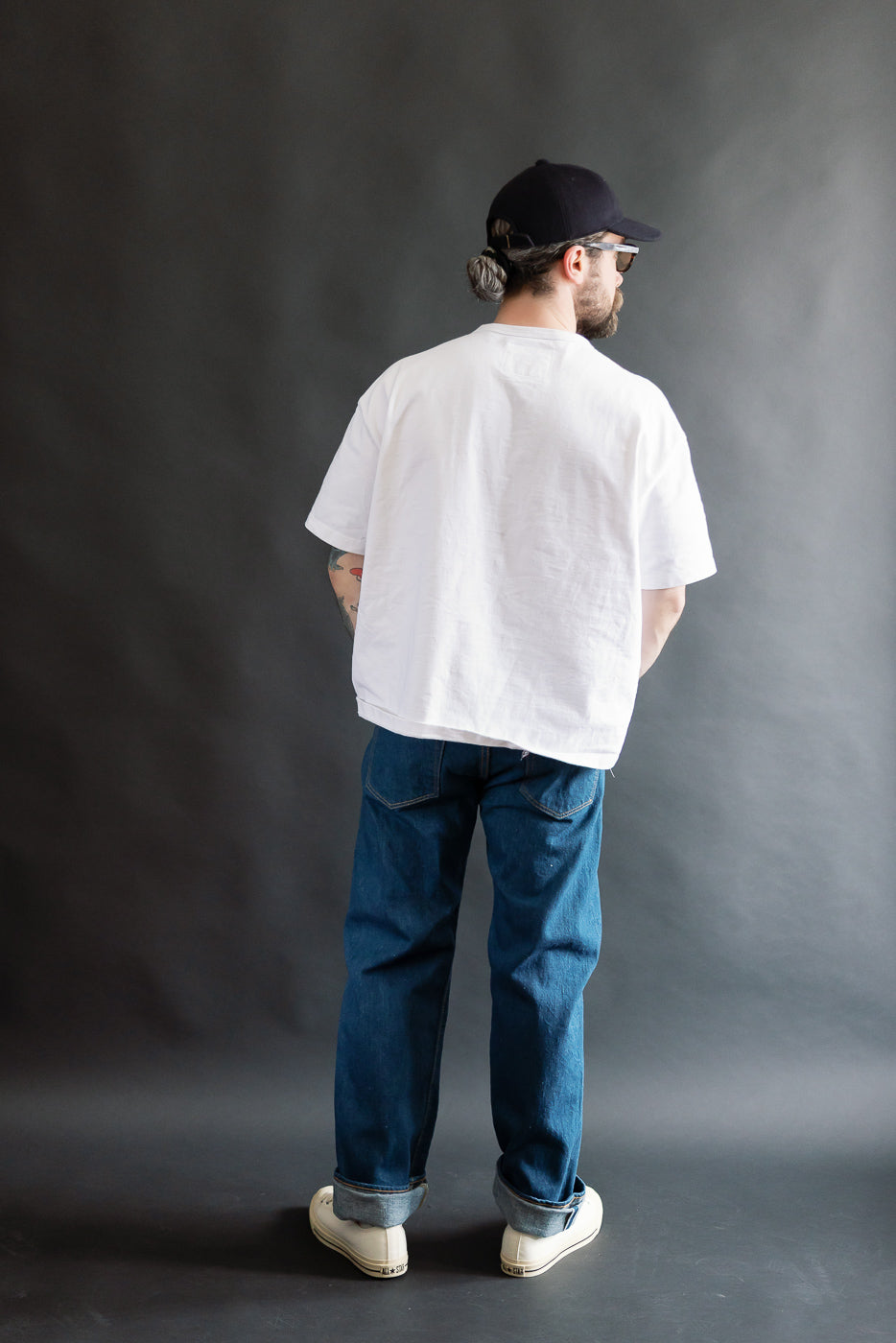 Full body rear view of male model 5'9