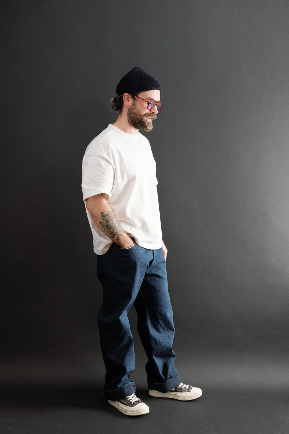 Full body side view of a male model, 5'9