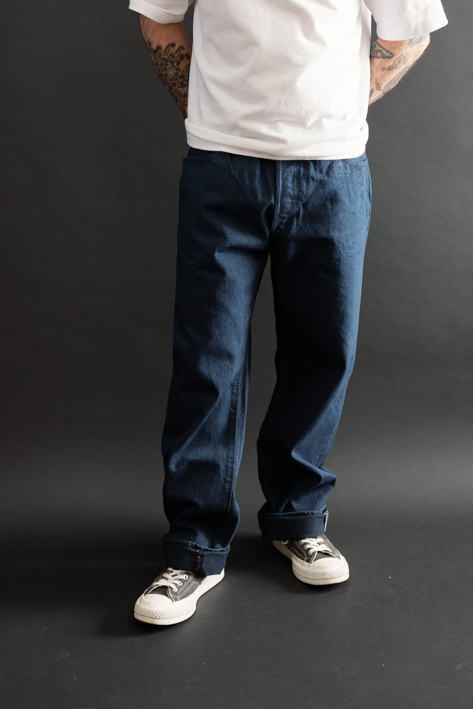 Full body front view of a male model, 5'9