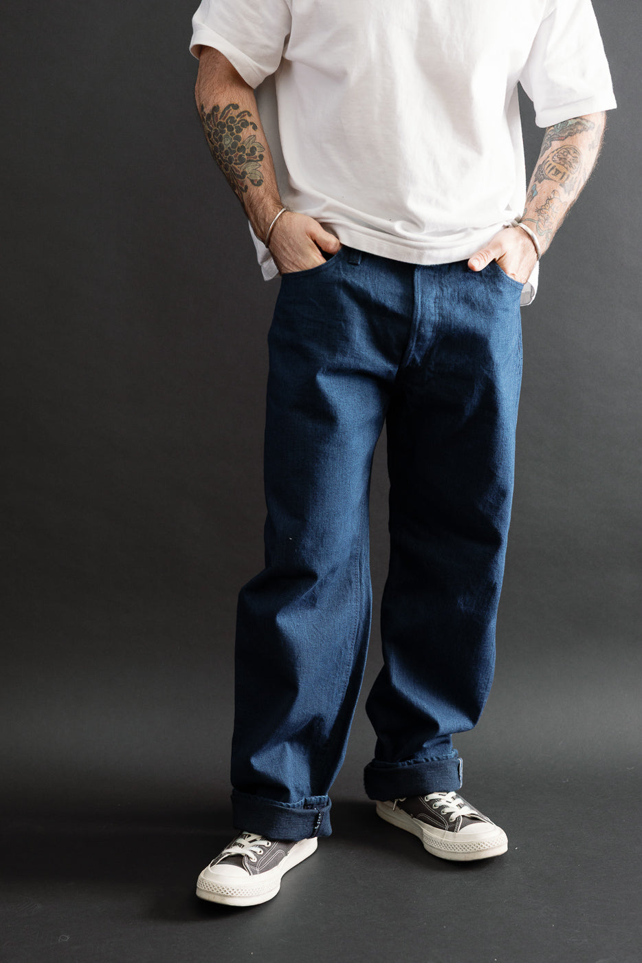 Full body front view of a male model, 5'9