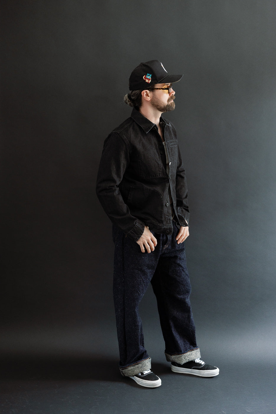 Full body, right side view of male model 5'9