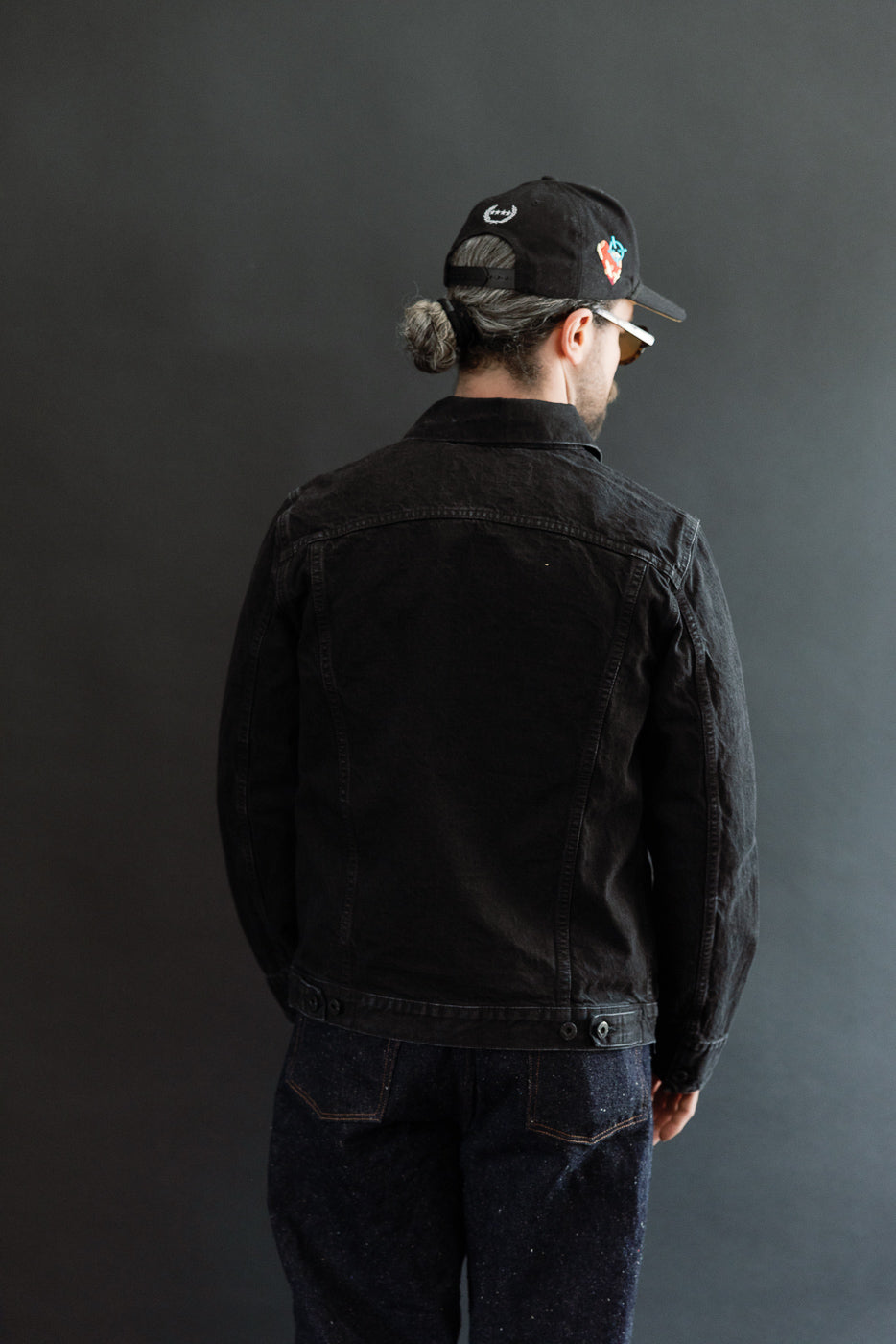 Full body rear view of male model 5'9